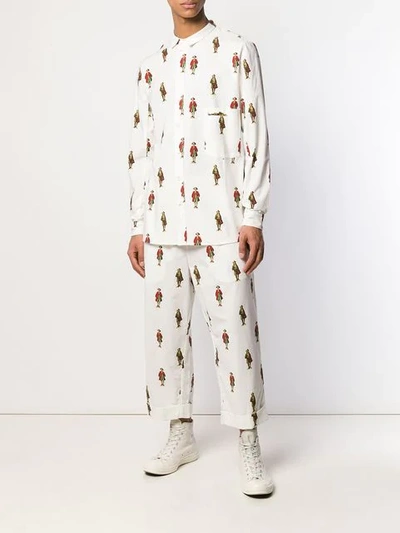 Shop Aleksandr Manamïs Historic Figure Print Trousers In White