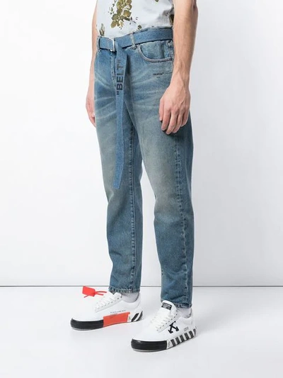 Shop Off-white Bleached Belted Jeans In Blue