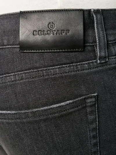 Shop Belstaff Faded Slim Jeans In Black