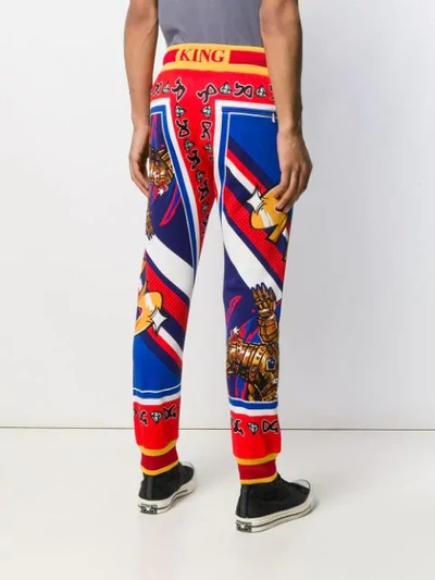 Shop Dolce & Gabbana Superhero King Print Track Pants In Red