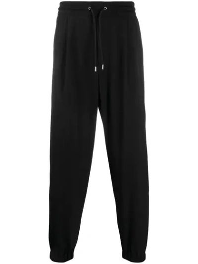 Shop Mcq By Alexander Mcqueen Athleisure Track Pants In Black