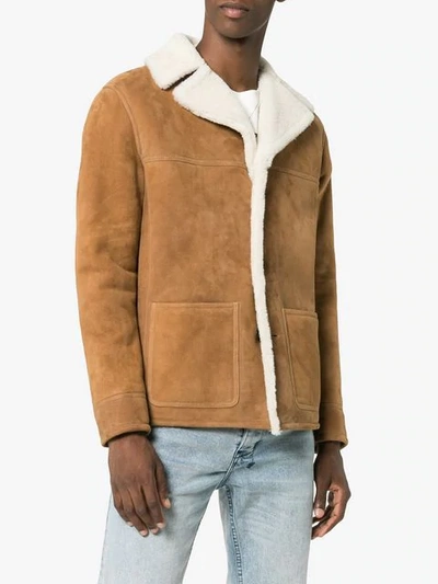 Shop Saint Laurent Trapper Shearling Jacket In 3363 -cognac/ecru