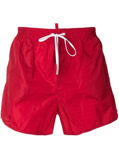 Shop Dsquared2 All Over Logo Swim Shorts In Red