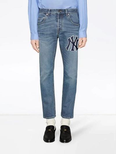 Shop Gucci Tapered Yankees Logo Jeans In Blue