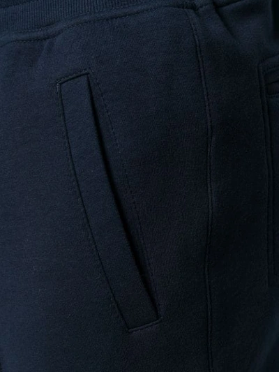 Shop Brunello Cucinelli Piped Seams Track Pants - Blue