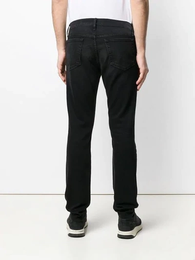 Shop Frame Straight Leg Jeans In Black