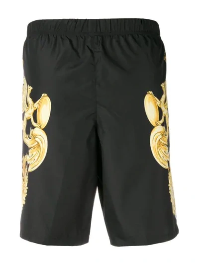 Shop Versace Printed Shorts - Black