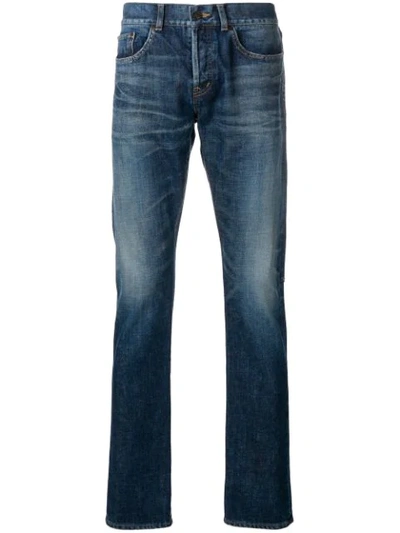 Shop Saint Laurent Distressed Mid-rise Straight Jeans In Blue