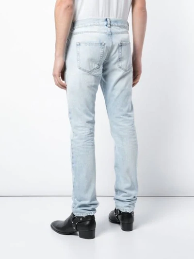 Shop Saint Laurent Regular Fit Jeans In Blue