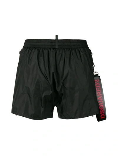 Shop Dsquared2 Wrist Strap Detailed Swim Shorts In Black