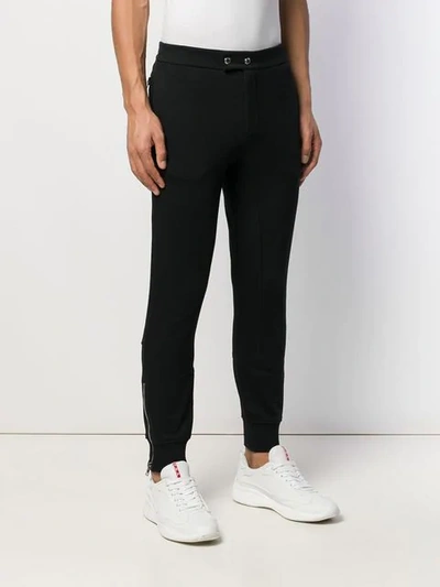 Shop Alexander Mcqueen Zipped Details Track Trousers In Black