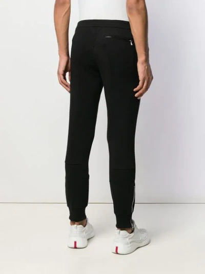 Shop Alexander Mcqueen Zipped Details Track Trousers In Black