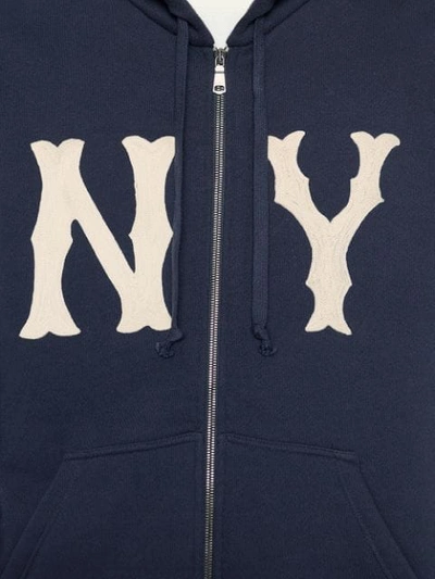 Shop the Men's jacket with NY Yankees™ patch by Gucci. A blue