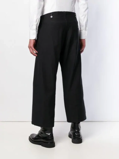 Shop Ann Demeulemeester Buttoned Cropped Trousers - Black