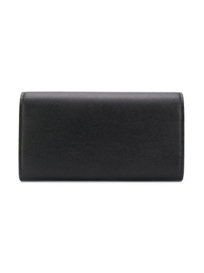 Shop Saint Laurent Large Thin Wallet In Black
