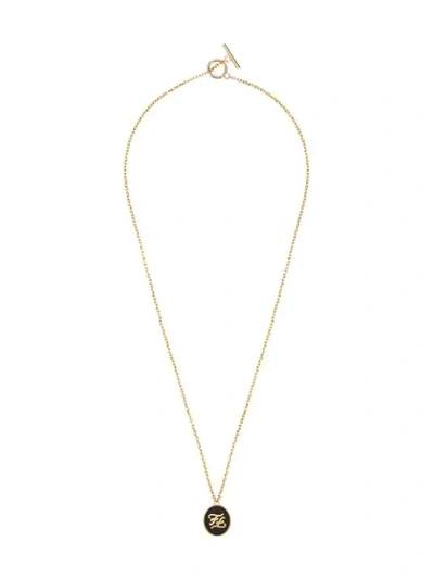 Shop Fendi Ff Logo Round Pendant Necklace In F18gy-burattato Gold +blac