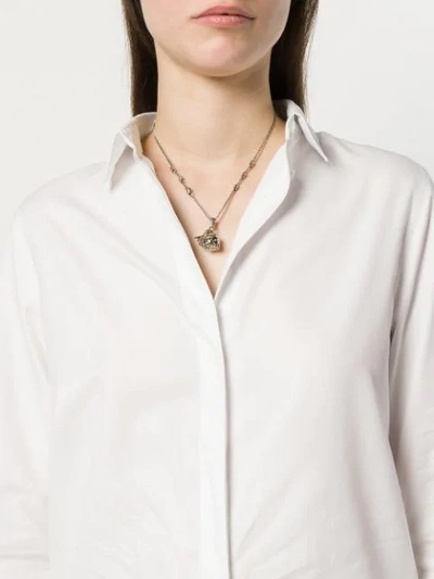 Shop Alexander Mcqueen Skull And Bird Charm Necklace In Metallic