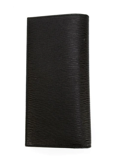 Shop Ferragamo Long Trifold Wallet In Black