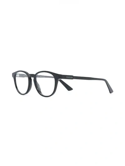 Shop Gucci Oval Frame Glasses In 001 Black