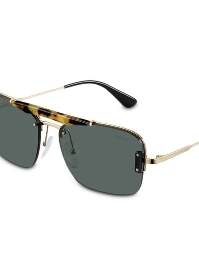 Shop Prada Tortoiseshell Sunglasses In Gold