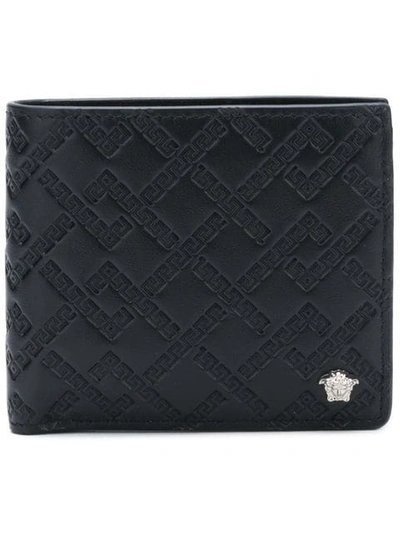 Shop Versace Grecca Embossed Wallet In Black