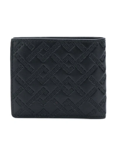 Shop Versace Grecca Embossed Wallet In Black