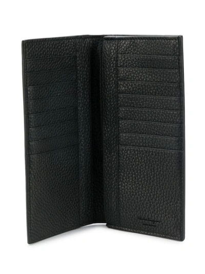 Shop Ferragamo Gancio Embossed Logo Wallet In Black