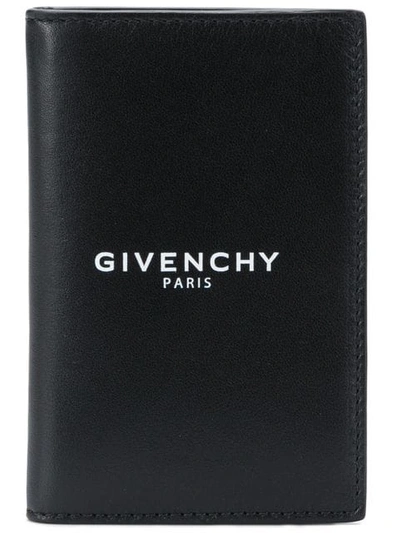 Shop Givenchy Embossed Logo Wallet In Black
