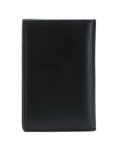 Shop Givenchy Embossed Logo Wallet In Black