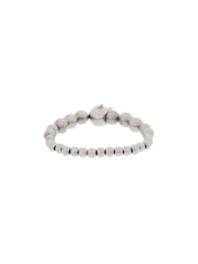 Shop Alexander Mcqueen Skull Beaded Bracelet In Metallic