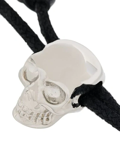 Shop Alexander Mcqueen Woven Skull Bracelet In Black
