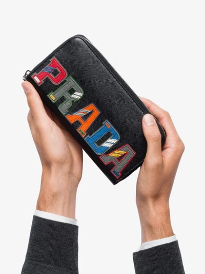 Shop Prada Logo Patch Continental Wallet In Black