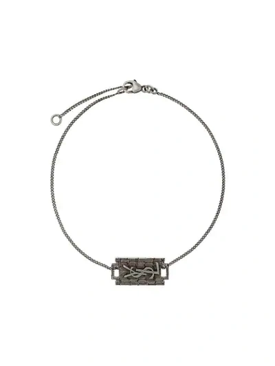 Shop Saint Laurent Antique-effect Monogram Plaque Bracelet In Metallic