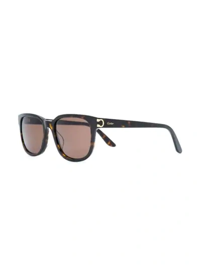 Shop Cartier C Décor Sunglasses - Brown
