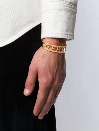 Shop Versace Logo Bracelet In Gold