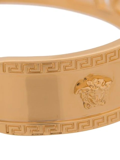 Shop Versace Logo Bracelet In Gold