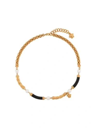 Shop Versace Braided Medusa Necklace In Gold