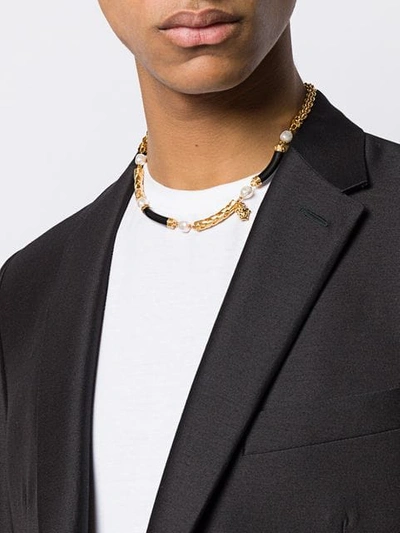 Shop Versace Braided Medusa Necklace In Gold