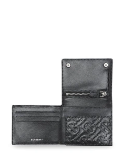 Shop Burberry Monogram Embossed Leather Trifold Wallet In Black