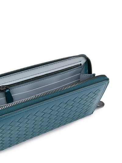 Shop Bottega Veneta Zip-around Intrecciato Wallet - Farfetch In Blue