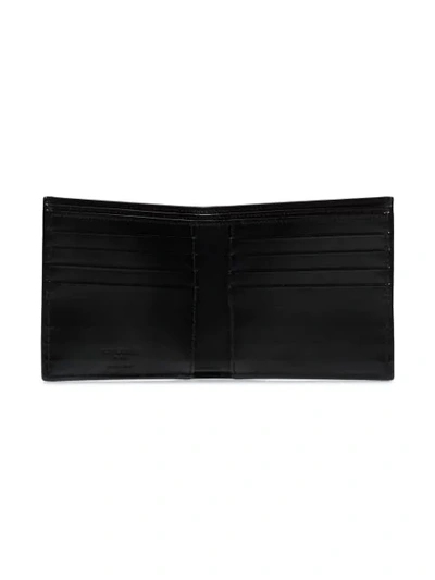 Shop Saint Laurent East/west Star Print Bi-fold Wallet In Black