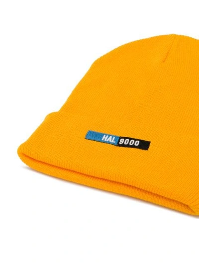 Shop Undercover Front Patch Beanie Hat In Orange