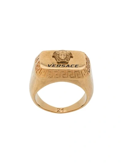 Shop Versace Engraved Logo Rectangle Ring In Gold