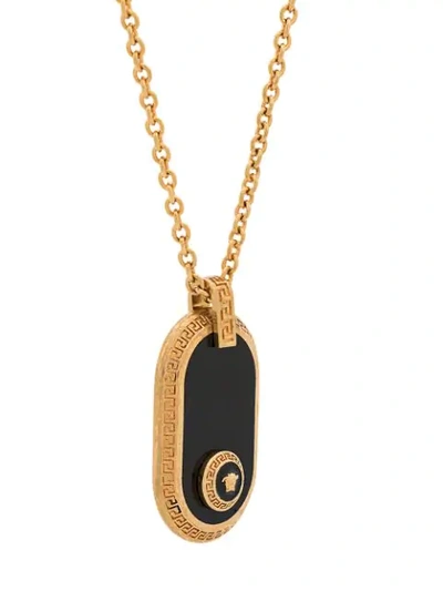 Shop Versace Medusa Motif Pendant Necklace In Gold