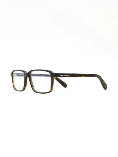 Shop Saint Laurent Eyewear Rectangular Frame Glasses - Brown