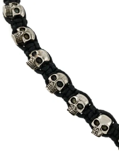 Shop Alexander Mcqueen Multi Skull Bracelet In Black