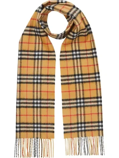 Shop Burberry Classic Checked Scarf In Yellow