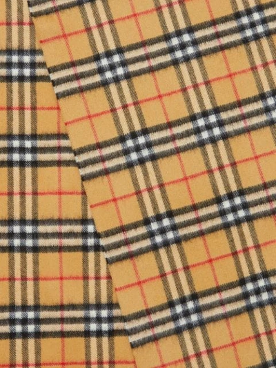 Shop Burberry Classic Checked Scarf In Yellow