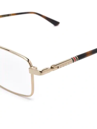 Shop Gucci Eyewear Rectangle Frame Glasses - Gold