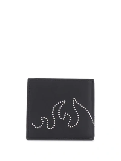 Shop Alexander Mcqueen Studded Bi-fold Wallet In 1000 Black